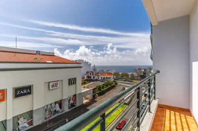 a balcony with a view of the ocean at Ivanna Apartament by Holiday Rental Madeira in Funchal