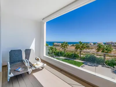 a room with a large window with a view of the ocean at Apt. Seabreeze in Lagos