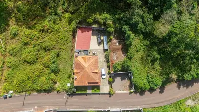 an aerial view of a house on a hill at Casa da Achada by YOUR KEY in Santana