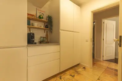 a kitchen with white drawers and a counter at Costa Azul by Atlantic Holiday in Funchal