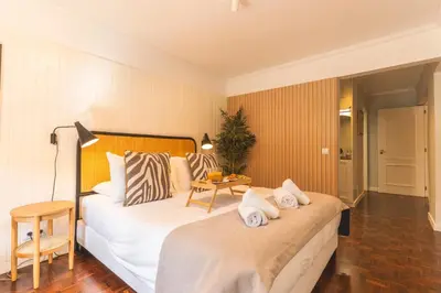 a hotel room with a bed and a table at Costa Azul by Atlantic Holiday in Funchal