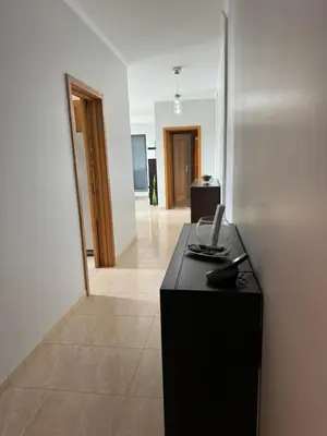 a room with a black desk with a phone on it at Barreiros View Vacations in Funchal
