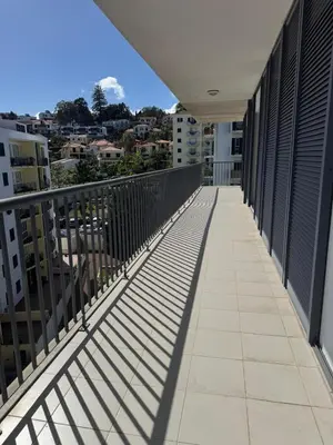 a balcony with a view of a city at Barreiros View Vacations in Funchal