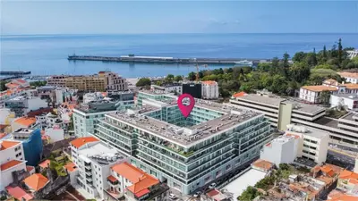 an aerial view of a building with a red arrow on it at Cantinho do Atlântico in Funchal