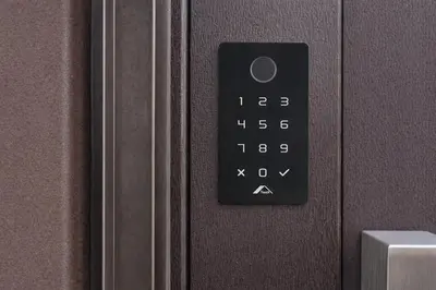 a close up of a remote control on a door at Tulip Apartments Funchal by Mercado dos Lavradores com AC in Funchal