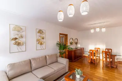 a living room with a couch and a table at GuestReady - Charming retreat in Funchal in Funchal