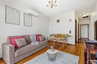 a living room with a couch and a table at Horizon Glow II by Zest & Guest in Ponta do Pargo