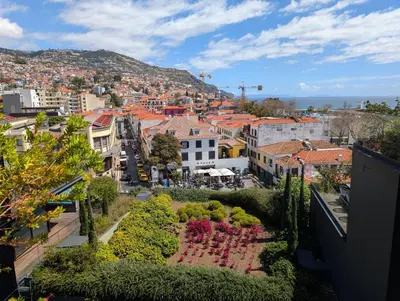 a view of a city with buildings and trees at Savoy Residence City Loft - Style and Sophistication in Funchal
