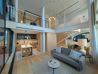 a living room with a couch and a table at Savoy Residence City Loft - Style and Sophistication in Funchal