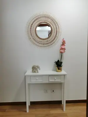 a white dressing table with a mirror and a cat on it at Pico Barcelos - Funchal in Funchal