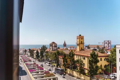 a view of a city street with cars and buildings at GuestReady - Perfect home in the city centre in Funchal
