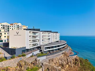 a rendering of a hotel on the edge of the ocean at Oceanfront Elegance Madeira Retreat in Câmara de Lobos