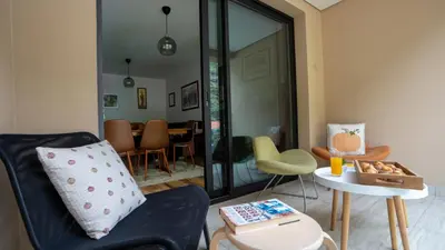 a living room with a couch and a table at Brava Suite by LovelyStay in Ribeira Brava