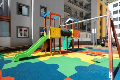 a playground with a slide in a building at Brava Suite by LovelyStay in Ribeira Brava
