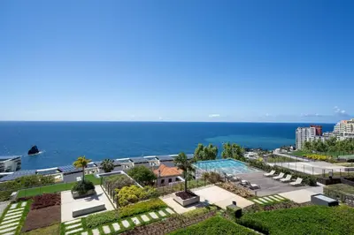 a view of the ocean from a building at Savoy Monumentalis III by An Island Apart in Funchal