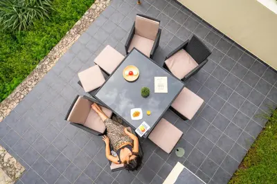 an overhead view of a woman laying on a table at Rosa Villa Porto Santo by YOUR KEY in Porto Santo