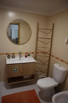 three vases sitting on top of a bathroom sink at Art House Madeira I in Caniço