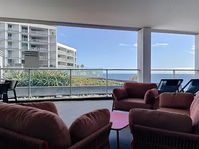 a living room with two couches and a large window at MPR The Finnest by Atlantic Holiday in Funchal