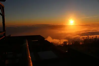 a view of the sun rising above a sea of clouds at Madeira Native Motion Apartment in Ponta do Pargo