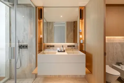 a bathroom with a white sink and a shower at Luxury in Funchal - Savoy Monumentalis II in Funchal