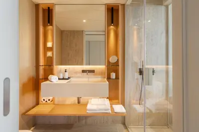 a bathroom with a sink and a shower at Luxury in Funchal - Savoy Monumentalis II in Funchal