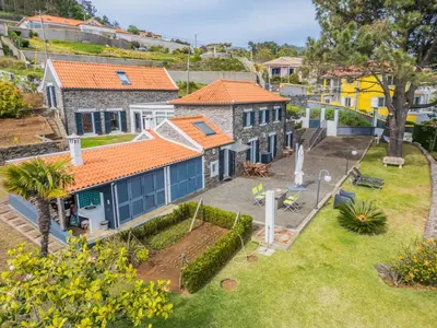 an aerial view of a house with a yard at Quinta da Fonte in Prazeres