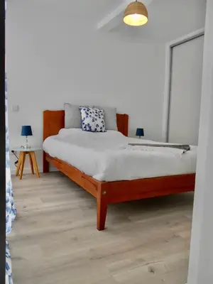 a bedroom with a bed in a room at Holiday apartments Funchal - Rosemary in Funchal