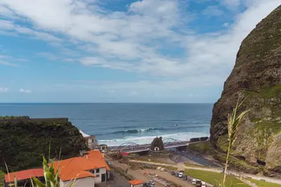 a view of the ocean from a cliff at GuestReady - Scenic Retreat with Stunning Views in São Vicente