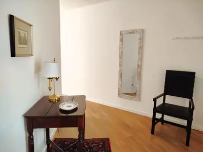 a white kitchen with a stove and a refrigerator at Alamos Charming Apartments - Garden in Funchal