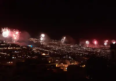 a city lit up with fireworks at night at Alamos Charming Apartments - Garden in Funchal