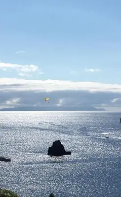 a frisbee flying over a large body of water at Endless Holiday 2 Bedroom Apartment Lido in Funchal