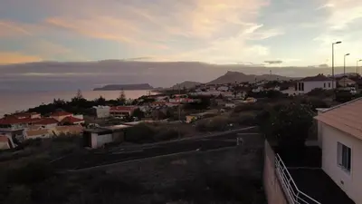 a view of a town with the ocean in the background at Vivenda Nina in Porto Santo