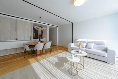 a living room with a white couch and a table at Savoy Residence Monumentalis 2B or Not 2B by LM&AC Signature in Funchal