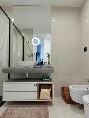a bathroom with a sink and a mirror at Virtudes Charm in Funchal