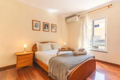 a dining room with a glass table with a plate of food at HappyStay by Atlantic Holiday in Ribeira Brava