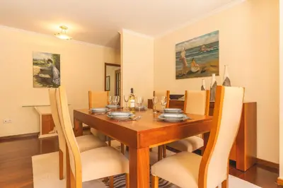 a living room with a couch and a television at HappyStay by Atlantic Holiday in Ribeira Brava