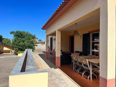 a bedroom with a bed and a bunk bed at Villa Antonius in Porto Santo