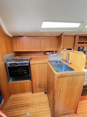 a kitchen with a sink and a stove in it at Timeresci in Calheta