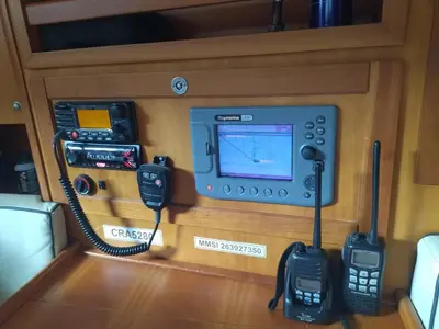 a room with two cell phones and a computer on the wall at Timeresci in Calheta