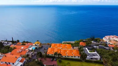 an aerial view of a town next to the ocean at Villa Frente Mar by ESCAPE to Madeira in Funchal