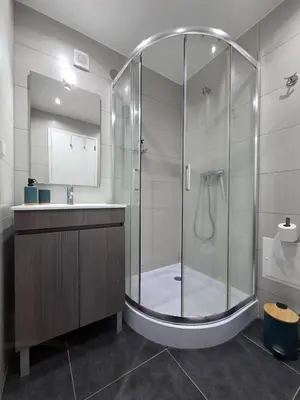 a bathroom with a shower and a sink at The Infante Stay in Funchal