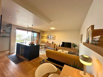 a living room with a couch and a table at Colours by Madeira Best Apartments in Funchal