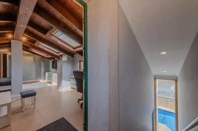 an office with a pool in the middle of a room at Bela Vista Exclusive Private Villa in Praia da Luz in Luz