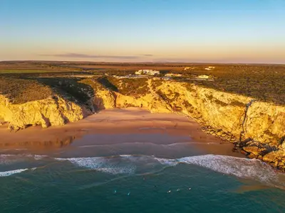 an aerial view of a cliff over the ocean at Modern Old Town House with Sunny Terrace in Vila do Bispo