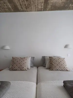 two beds sitting next to each other in a room at Casa Fá - NEW T4 - Aljezur in Aljezur