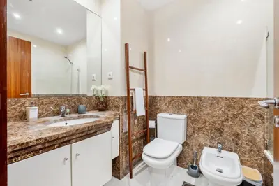 a bathroom with a toilet and a sink at Madeira Emotions II, By OP in Funchal