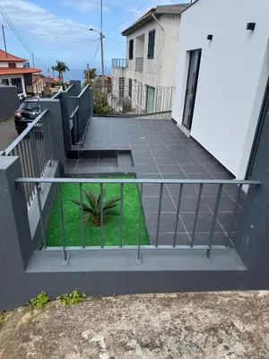 a view of a balcony of a house at Casa do Farol Guest House in São Jorge