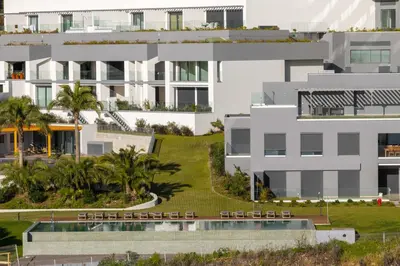 an aerial view of a building with a swimming pool at With pool and sea view - Acqua Residence III in Funchal