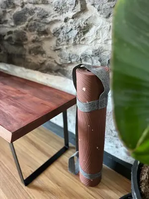 a vase sitting on top of a wooden bench at NEW! Nature Paradise with Ocean View & Hot Tubs in Fajã da Ovelha
