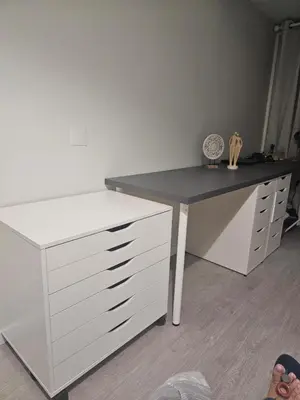 a white desk with a black counter top in a room at Gratitude Apartment in Funchal
